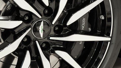 Moscow, Russia - November, 2020: Aston Martin sports car aluminum wheel disc and brake caliper