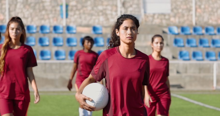 Group of confident female soccer players walking before game | Shutterstock HD Video #1062223774