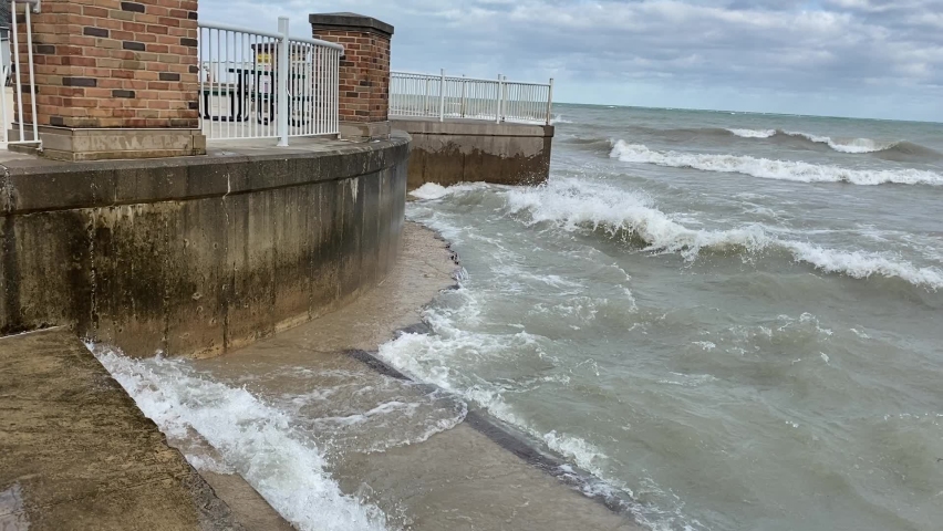 Waves crash against the break wall and jetty during a November wind storm on Lake Michigan. Taken at Kenilworth Beach on the Illinois shore.