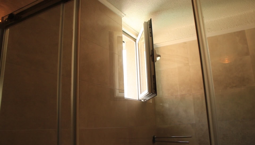 Glass shower door closing. Bottom view from inside. Royalty-Free Stock Footage #1062239485