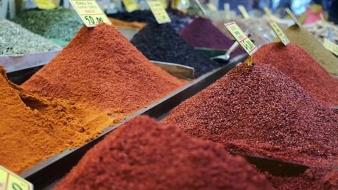 Camera moves by focusing on famous Gaziantep hot pepper spices in bazaar
