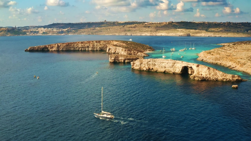 Aerial view of Comino island and Blue lagoon. Malta | Shutterstock HD Video #1062253891