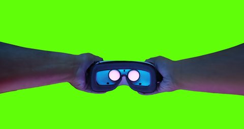 POV Green Screen Mans Hands Putting Virtual Reality Headset Innovation Exploring Reality Immersive Technologies XR VR AR MR Hybrid Reality New Technologies Future Slow Motion 8k RED