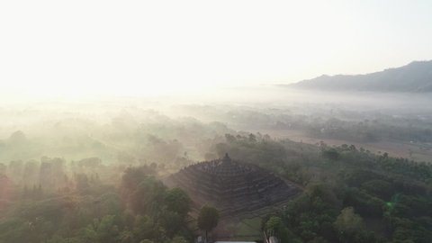 Borobudur temple shining with the light of the rising sun_wonderfull indonesia