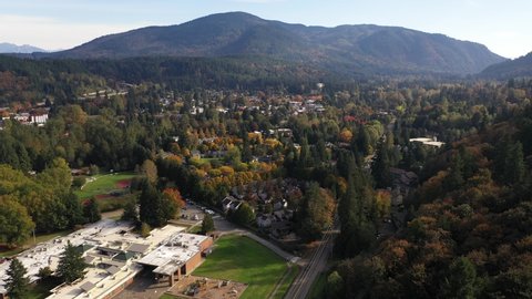 Aerial / drone footage of Issaquah, Olde Town, Sycamore, Squak Mountain, Tiger Mountain, Park Pointe, Poo Poo Point, commercial area and surrounding suburbs in King County, Washington