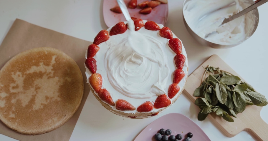 Decorate cake with strawberry birthday cake home cook sweet wooden dessert food cream strawberry pie gourmet decorate party fresh homemade rustic red summer fruit berry tasty | Shutterstock HD Video #1062315523