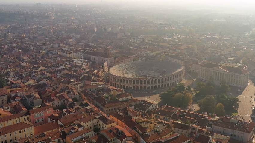 Verona, Italy: Aerial view of Verona Arena, well-preserved Roman amphitheater in historic center of city - landscape panorama of Europe from above Royalty-Free Stock Footage #1062320197