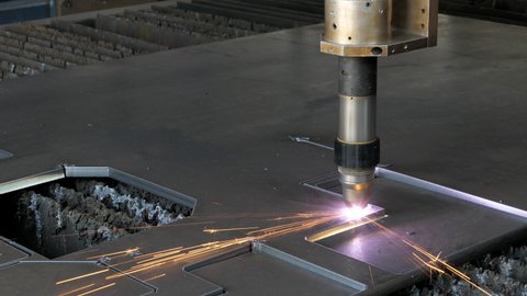 Plasma Machine Cuts Thick Metal. Plasma cutting machine, metal processing, metalwork industry