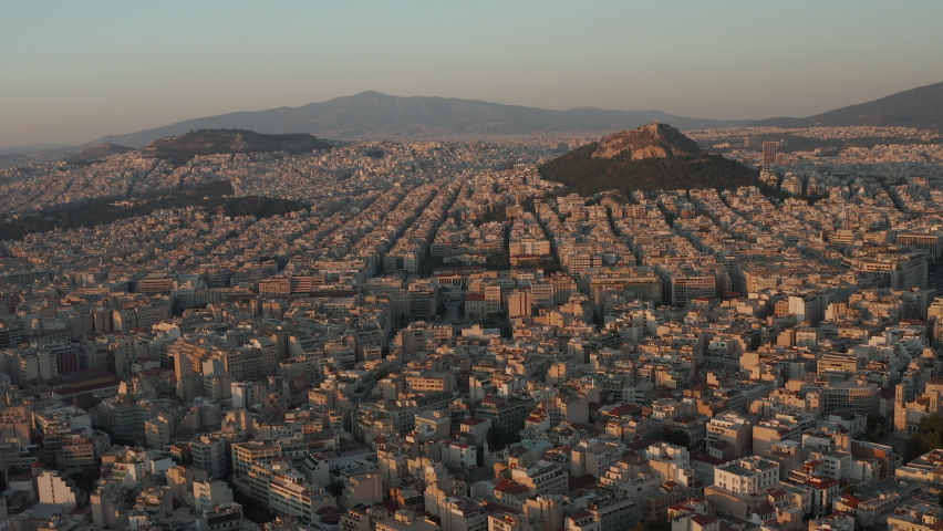 Slow Establishing Dolly Aerial towards Mount Lycabettus in Athens, Greece Royalty-Free Stock Footage #1062324631