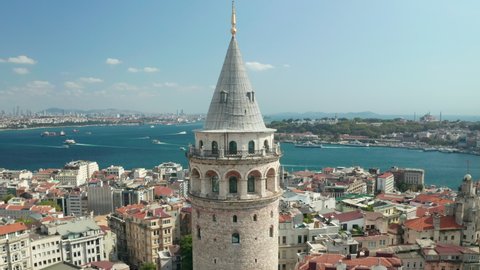 Flight above Galata Tower in Istanbul, Turkey and tilt down in Birds Eye View perspective, Aerial Scenic