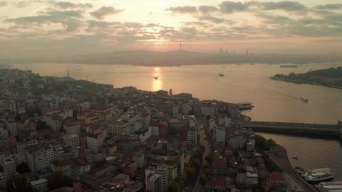 Sunrise Morning over Istanbul from an Aerial Drone Perspective with Golden Light reflecting on Bosphorus