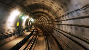 Copenhagen, Denmark. Riding the metro in Copenhagen, Denmark with motion blurred tube lines in tunnel - Powered by Shutterstock - Get 15% off with code: PIKWIZARD15