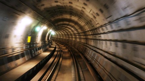 Copenhagen, Denmark. Riding the metro in Copenhagen, Denmark with motion blurred tube lines in tunnel