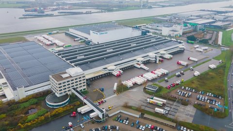 Zaandam, 14th of November 2020, The Netherlands. Albert Heijn distribution center logistical hub aerial hyperlapse top down view