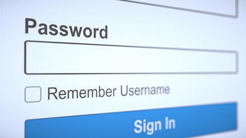 Typing username and password to securely login to website or network.