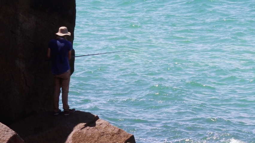 Person fishing in the sea