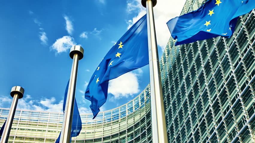 European Union flags waving in the wind in front of European Commission. Brussels, Belgium. Full HD, 1080p Royalty-Free Stock Footage #10623581