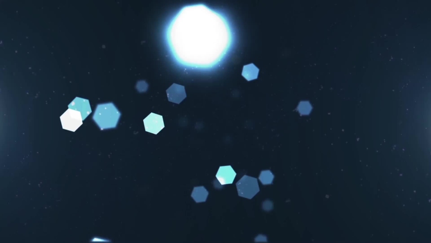 Bokeh of hexagonal shapes fading away into the distance of a dark blue atmosphere motion background