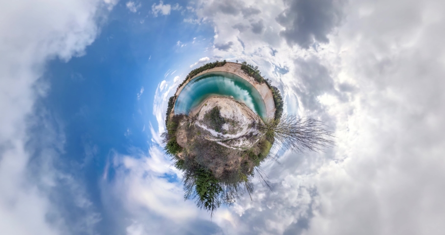 Curvature of space of tiny planet transformation. Abstract torsion and spinning of full flyby panorama landscape near lake with awesome clouds. loop rotate Royalty-Free Stock Footage #1062386008