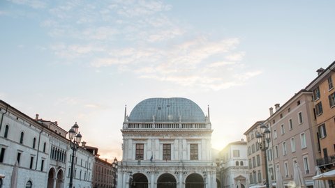 Time lapse of loggia place or square during a sunny cloudy day at the sunset. Location: Brescia, Lombardy, Italy