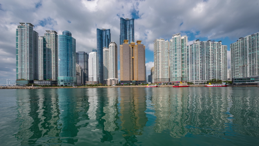 korea best view the skyscrapers marina city. Shadows across buildings in busan, south korea. (Time lapse 4k)