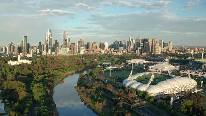 Aerial video of Melbourne sporting venues and CBD at sunrise Royalty-Free Stock Footage #1062412135