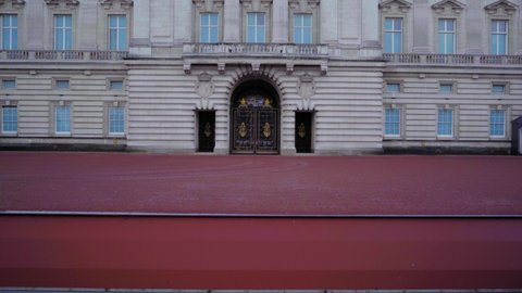 Through the gates of Buckingham Palace, an empty scene during lockdown pandemic in London.