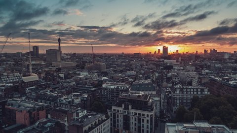 Generic Establishing Revealing Rising Up Aerial View Shot of London UK, United Kingdom, dramatic morning sky, wonderful colors