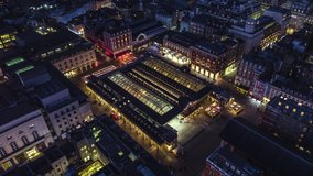 Aerial View Shot of London UK, Covent Garden, United Kingdom, at night evening, circling movement