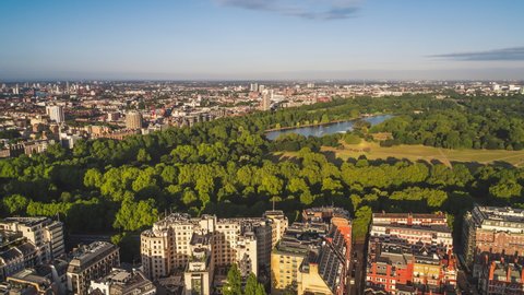 Establishing Aerial View Shot of London UK, sunny Hyde Park, United Kingdom, tracking to the side
