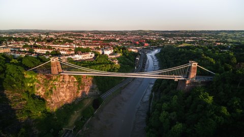 Aerial View Shot of Bristol UK, Breathtaking Clifton Suspension Bridge and River Avon, United Kingdom sunset late afternoon