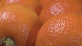 Mandarins close-up. Tropical fruit in the peel.