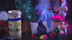 A video of Christmas gift and a blue hand watch for home decoration during Christmas celebration. 