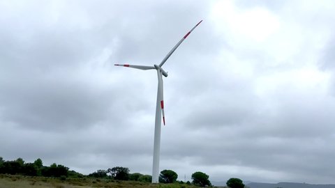 wind turbine with grey sky, Portoscuso,south Sardinia

