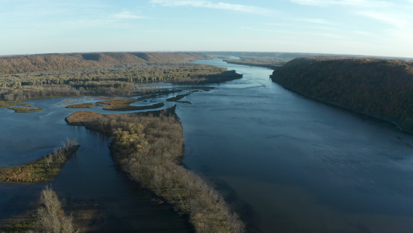 Mississippi River in Wisconsin Iowa in Autumn Main Channel Natural Ecosystem Moving Gliding Flying Over Aerial Drone