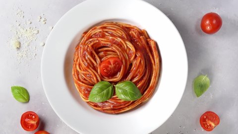 Spaghetti with tomato sauce top view. Pasta background
