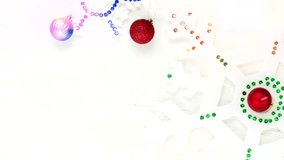 White snowflakes and Christmas decorations on a light wooden background. - Powered by Shutterstock - Get 15% off with code: PIKWIZARD15