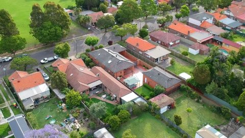 Drone panoramic aerial view of Sydney NSW Australia city Skyline and looking down on all suburban houses and streets