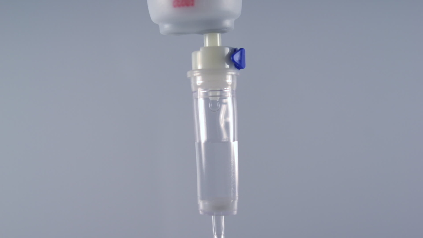 Saline fluid dripping from IV bag in 1000fps slow motion filmed with high speed camera | Shutterstock HD Video #1062486712