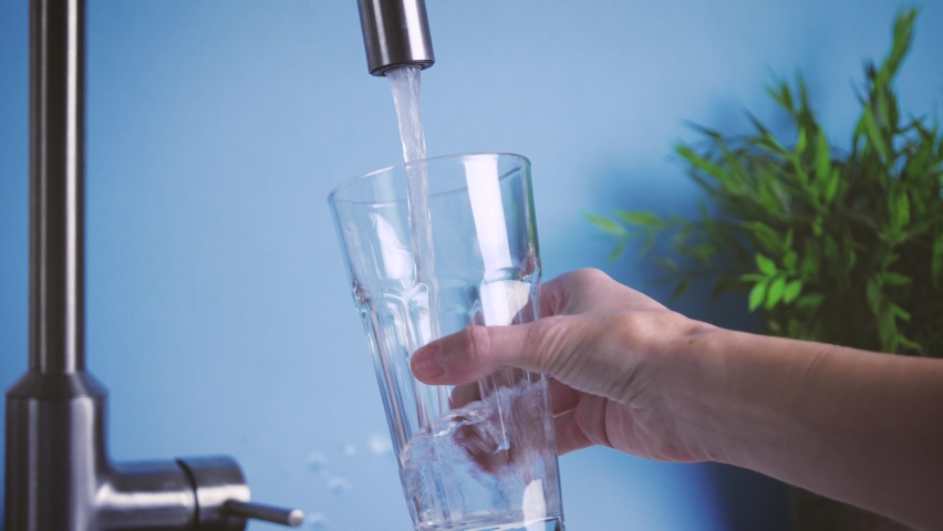 Filling glass by tap water. Fresh and pure home water, drink water is healthy lifestyle. Ecological and healthy drink | Shutterstock HD Video #1062489199