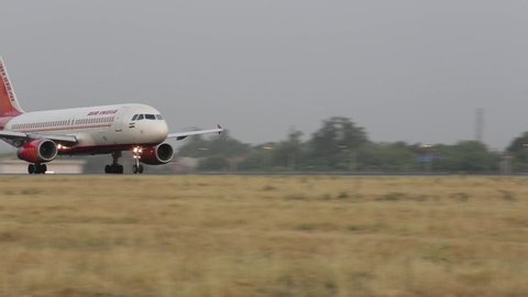 Delhi,India - 05/10/2012: Takeoff shot of Airplane/Aeroplane from runway at Delhi Airport.