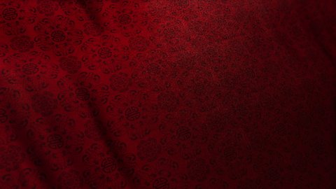 Traditional elegant Asian Double Happiness pattern in red color on waving looped cloth. Concept 3D animation shot for Chinese New Year and festive backgrounds. Luxurious full frame silk texture with c