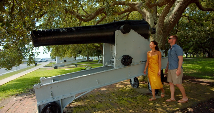 Couple Walking Past Historic Cannons in Park, Charlotte
