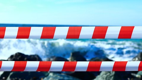 sea coast is closed , finish on bathing season sign outdoors