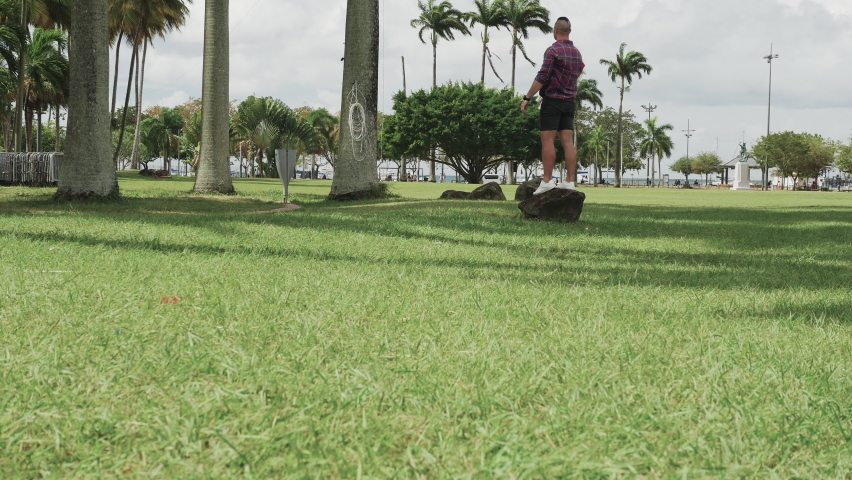 A crazy dancer, a strange man dancing, a crazy man in nature. Sport man