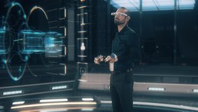 In the Near Future: Scientists and Engineers work in Modern Research Facility using Augmented Holographic Technology. Professional Industrial Designer wears Smart AR/VR Glasses and Gloves Controllers - Powered by Shutterstock - Get 15% off with code: PIKWIZARD15