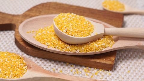 Dry Corn grits. The concept of the production of cereals from grain, products from corn.