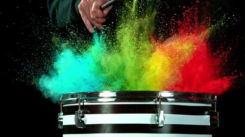 Super Slow Motion Shot of Drum Hit with Color Powder Explosion at 1000 fps.