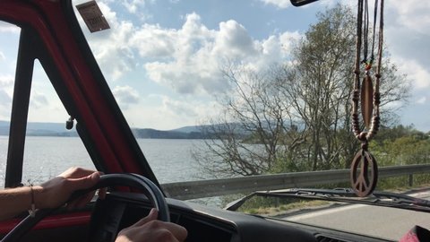 Ride a camping bus on a lake