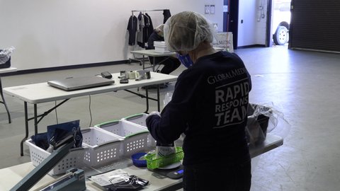 Toronto, Ontario, Canada November 2020 Volunteers prepare food bank aid Toronto people in COVID 19 Pandemic recession